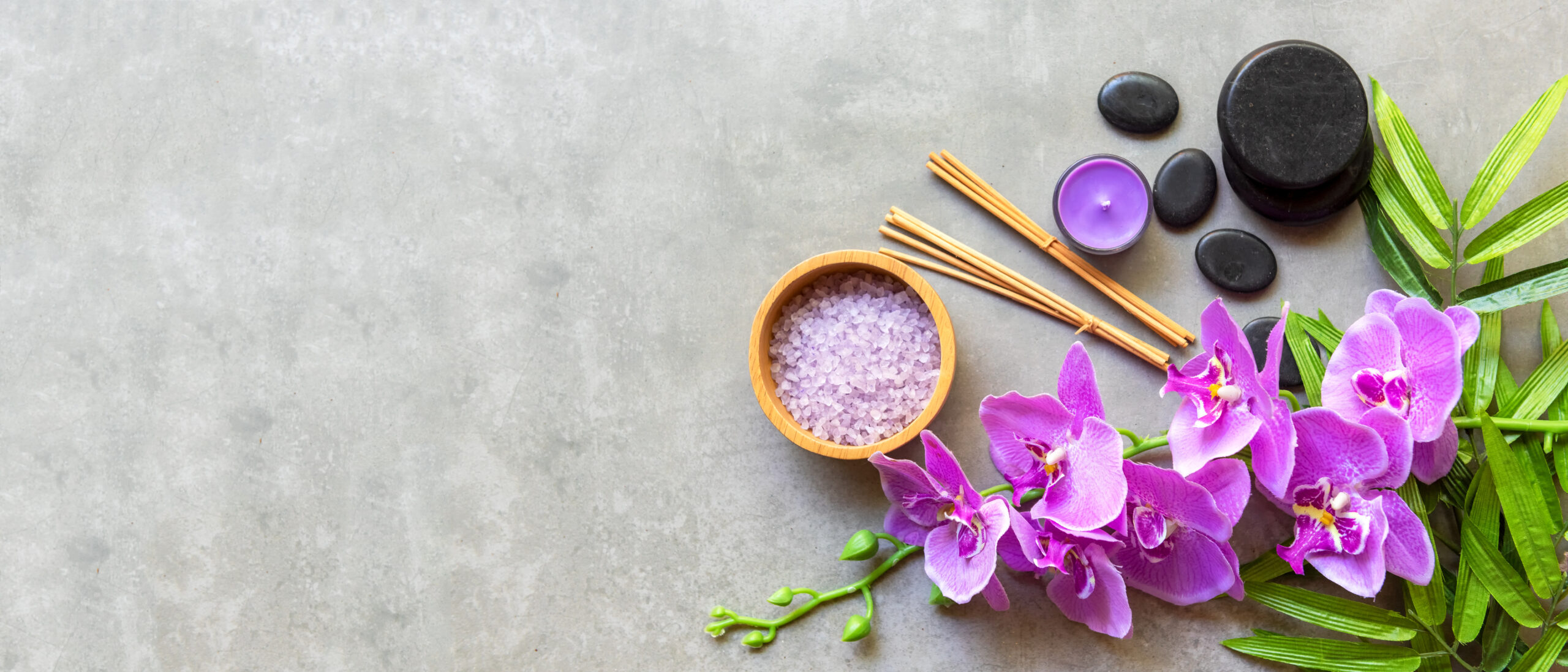 Thai Spa Treatments Aroma Therapy Salt And Sugar Scrub Massage With Purple Orchid Flower On Backboard With Candle. Thailand. Healthy Concept. Copy Space For Banner, Top View